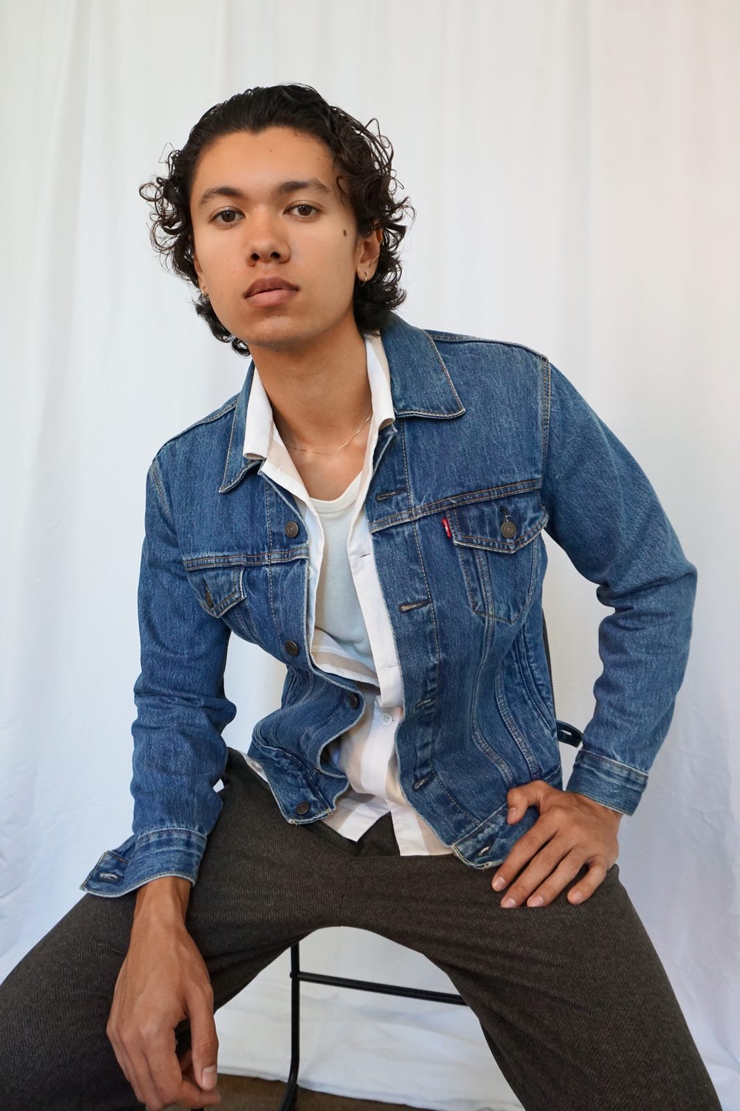 Quentin Lee in denim jacket, casual commercial look